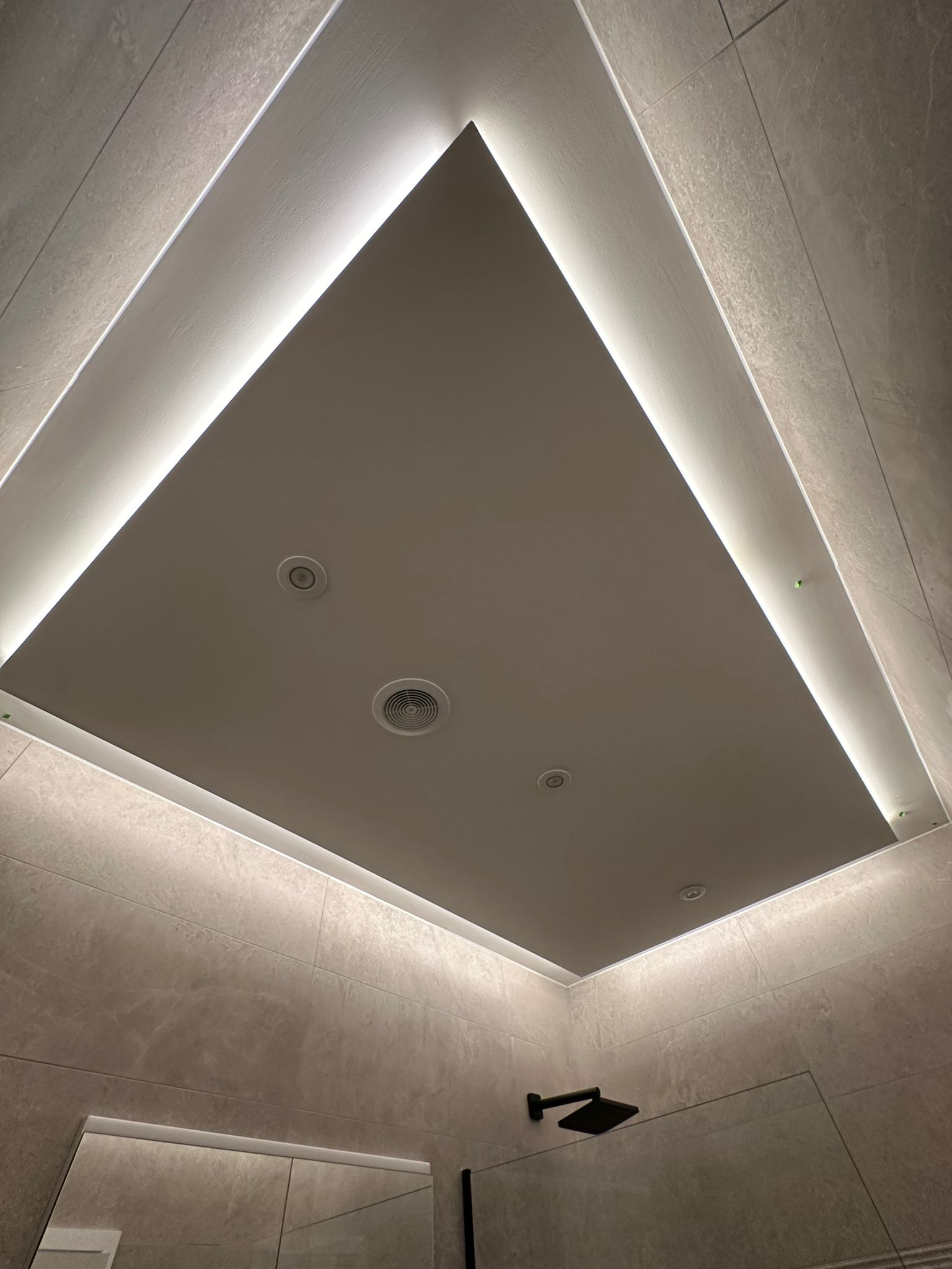 Ceiling lighting installation by electrician Cardiff.