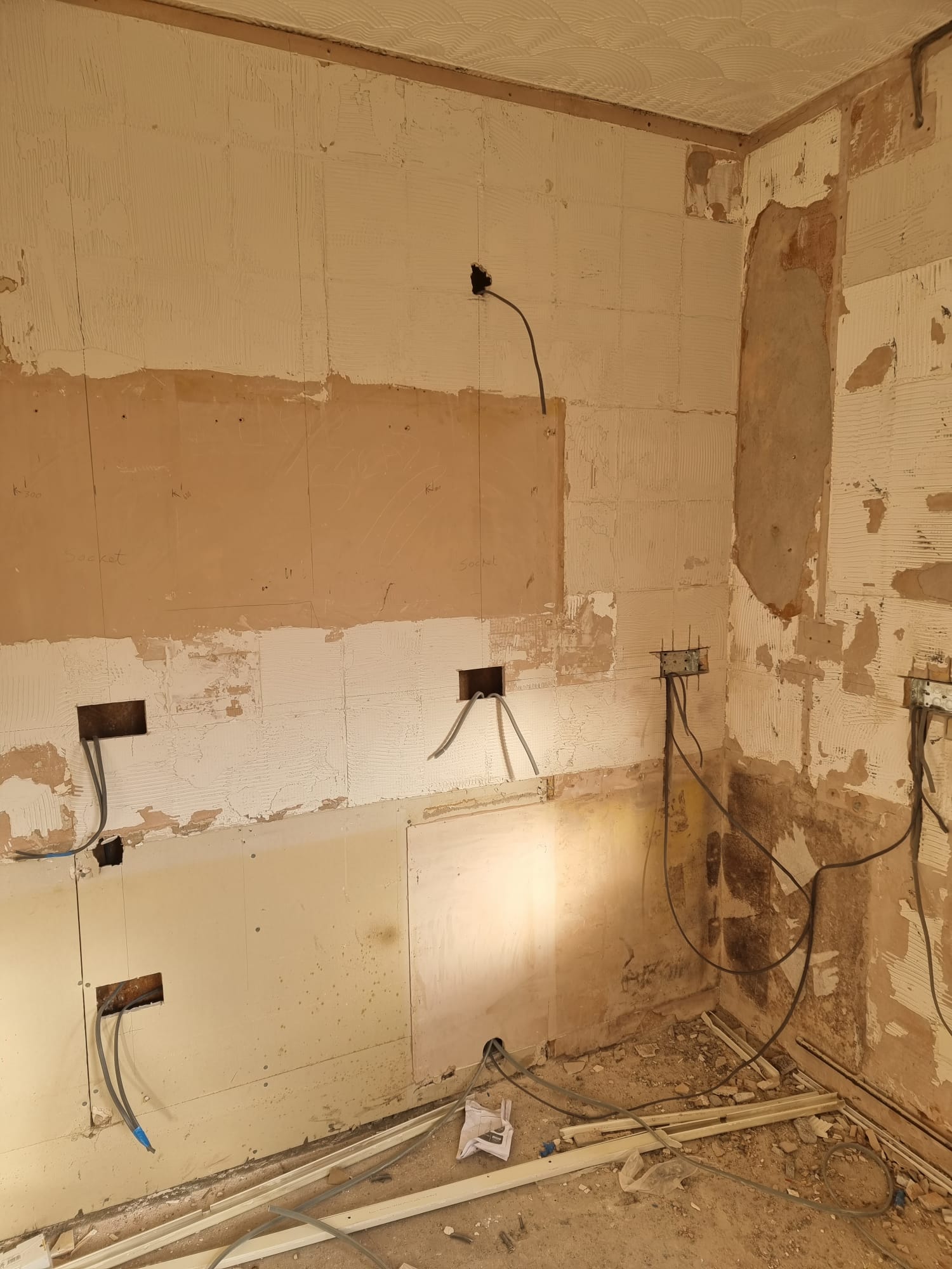 Electrical socket installation by electricians in Cardiff.