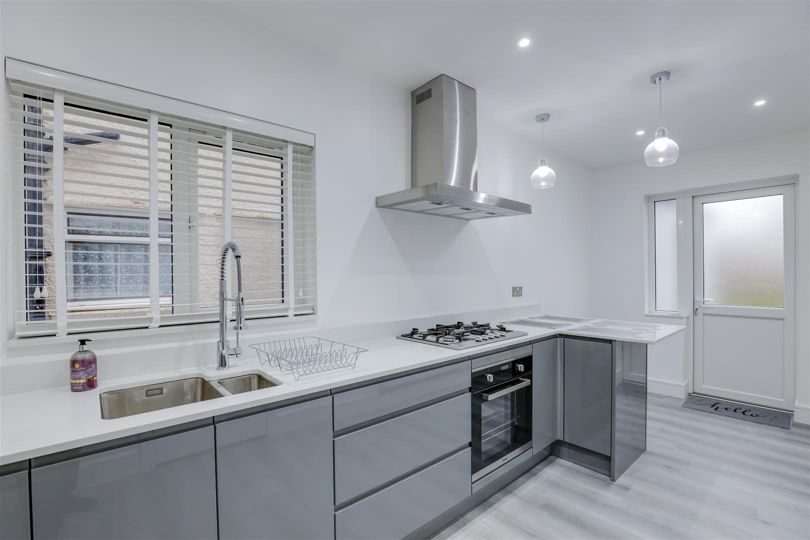 Kitchen lights installed by Cardiff electrician.