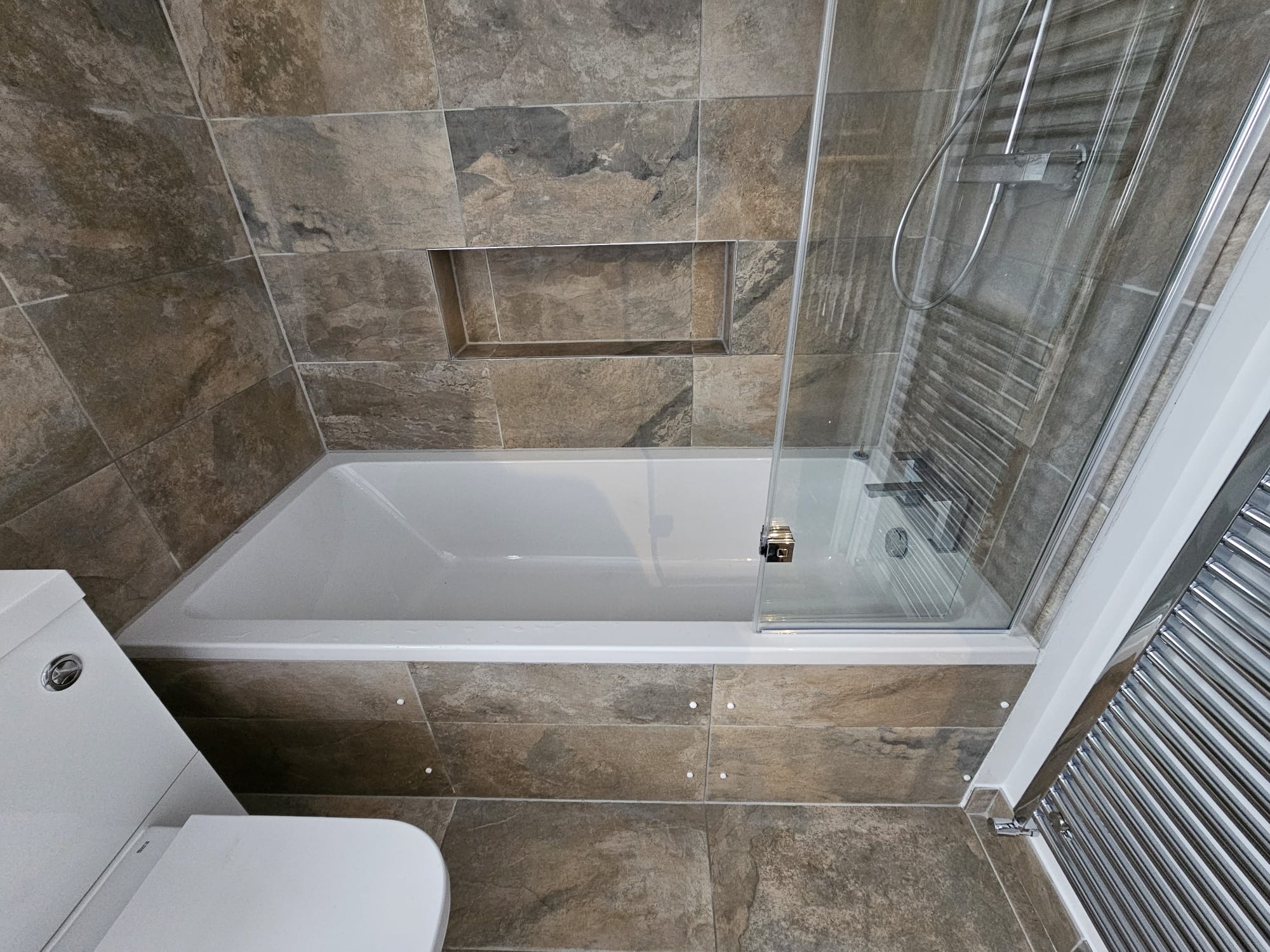 Bathroom suite installed by Cardiff plumber.