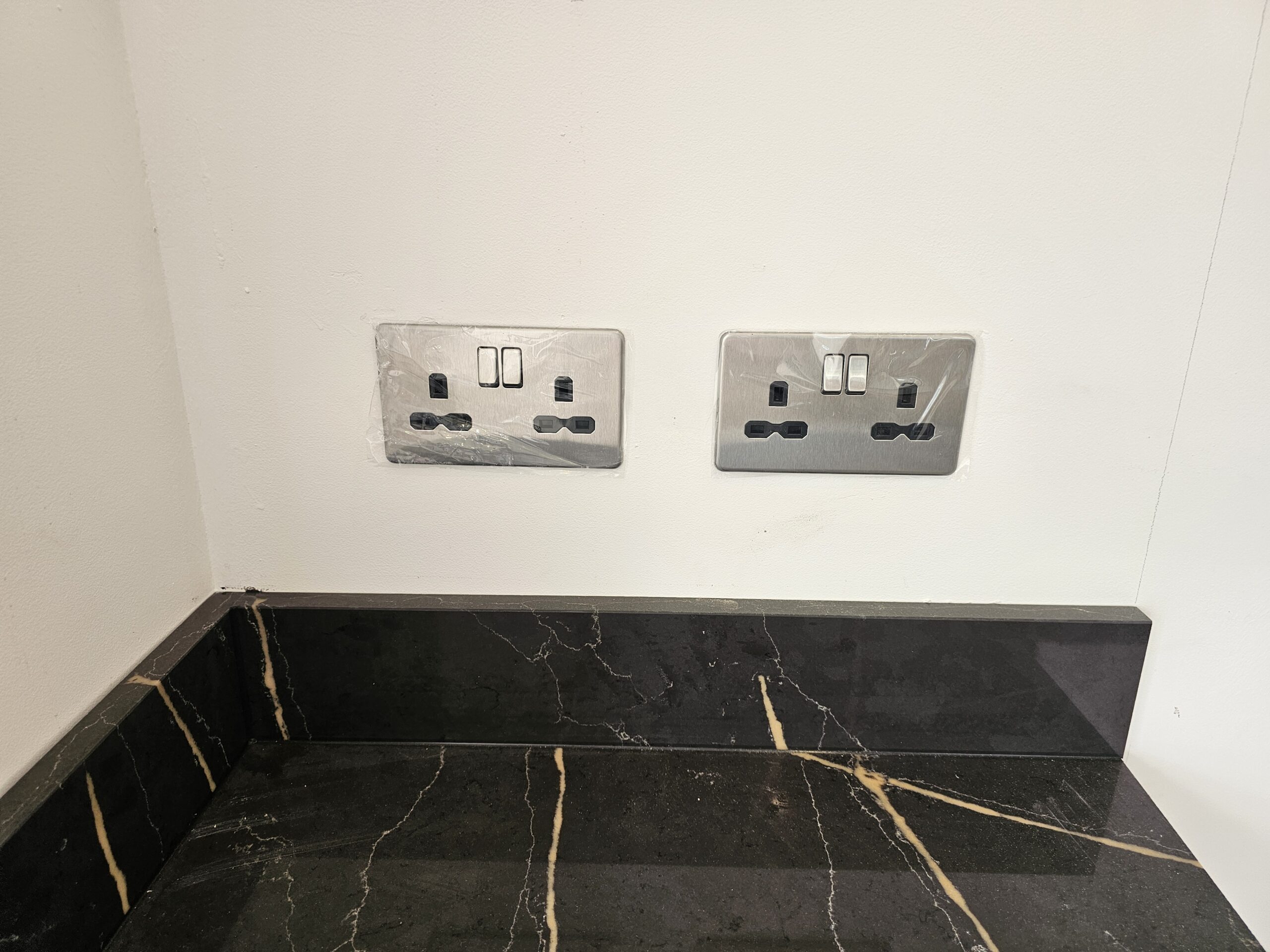 New sockets installed by electrician Cardiff.